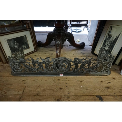 1280 - An unusual cast brass fire fender, 101.5cm wide. 