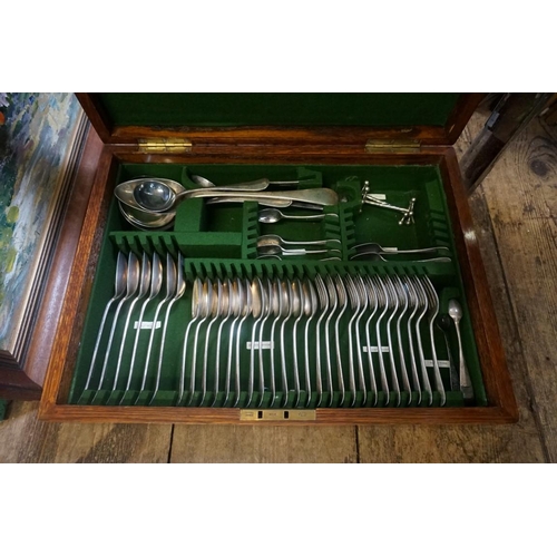 1285 - An oak canteen of electroplated cutlery; together with another similar empty canteen box. ... 