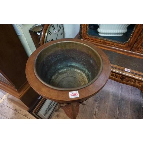 1305 - An Edwardian mahogany and inlaid jardiniere, with brass liner, 92.5cm high.