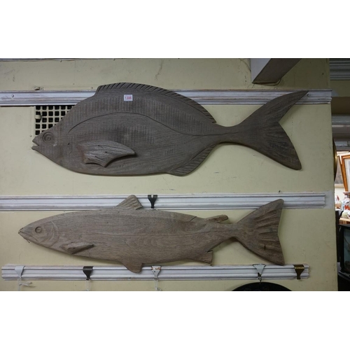 1306 - Two Folk Art carved oak fish, comprising: a salmon, inscribed 'Sarah Parish, 2000' verso, 97cm long;... 