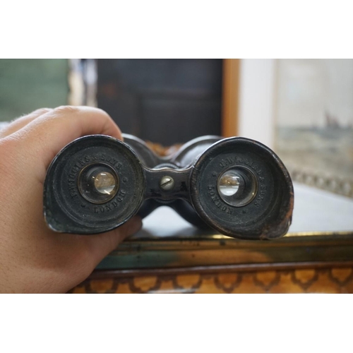 1316 - Two leather cased pairs of binoculars, comprising: Dollond 'The Lumina' 12x30; and Hensoldt & So... 