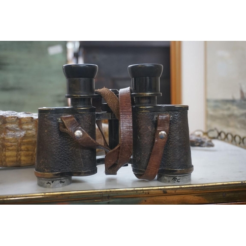 1316 - Two leather cased pairs of binoculars, comprising: Dollond 'The Lumina' 12x30; and Hensoldt & So... 