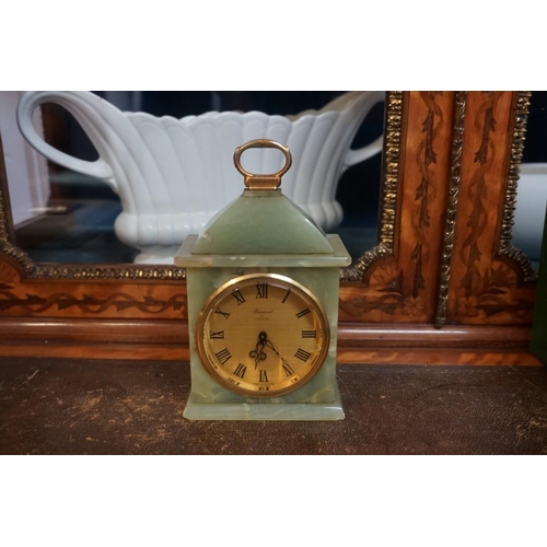 1321 - A 1930s Smiths 'Starburst' electric wall clock, 21cm diameter; together with another Smiths novelty ... 