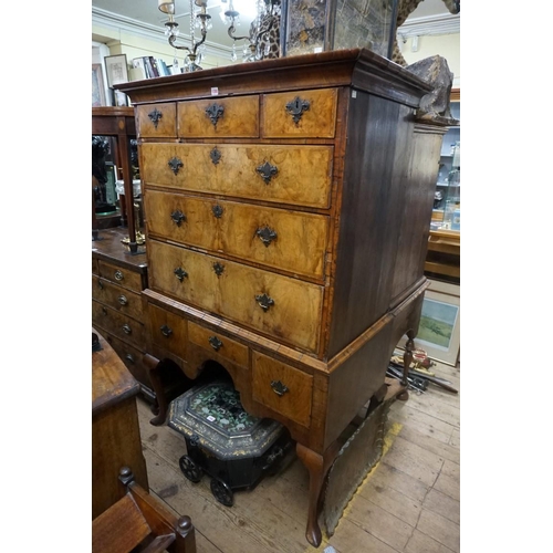 1358 - A George I walnut and feathered banded chest on stand, 110.5cm wide. 