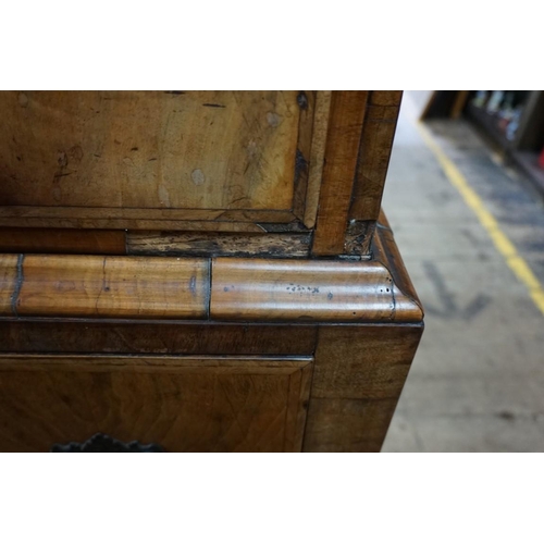 1358 - A George I walnut and feathered banded chest on stand, 110.5cm wide. 