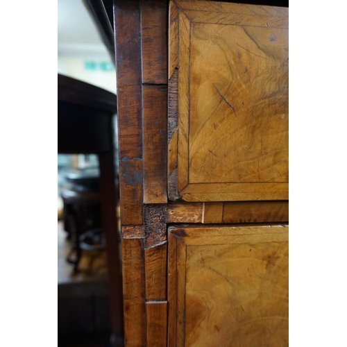 1358 - A George I walnut and feathered banded chest on stand, 110.5cm wide. 