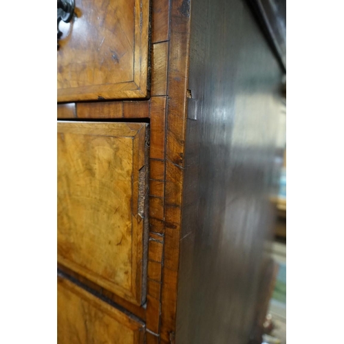 1358 - A George I walnut and feathered banded chest on stand, 110.5cm wide. 