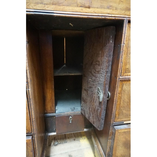 1379 - An 18th century walnut and featherbanded kneehole chest, 79cm wide.