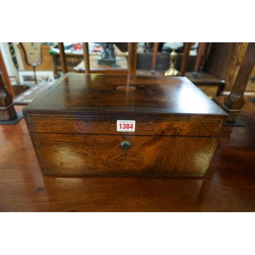 1384 - A 19th century rosewood and brass strung toilet box, with Bramah lock and brass countersunk han... 