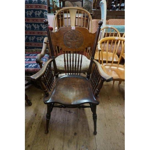 1410 - A early 20th century beechwood and elm armchair, with saddle seat. 