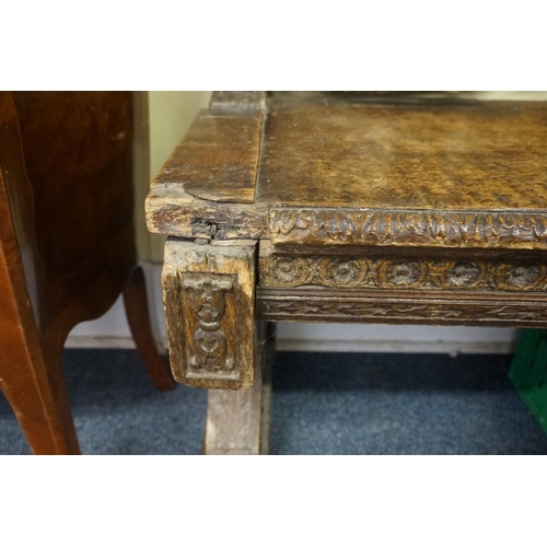 1429 - A large and unusual 19th century Continental carved walnut hall bench, probably Italian, 236.5cm wid... 