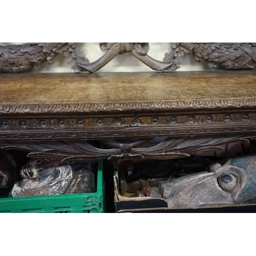 1429 - A large and unusual 19th century Continental carved walnut hall bench, probably Italian, 236.5cm wid... 