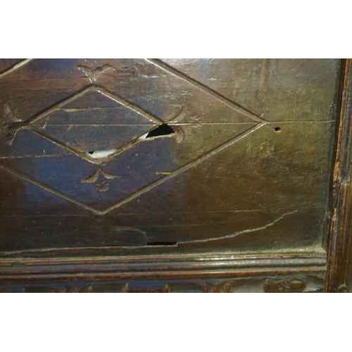 1439 - A late 17th century carved oak panelled coffer, 103cm wide, (repair to one front panel). ... 