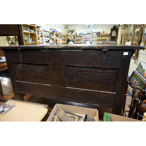 1439 - A late 17th century carved oak panelled coffer, 103cm wide, (repair to one front panel). ... 