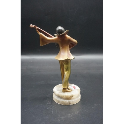 1461 - An Art Deco cold painted spelter figure of a musician, on onyx base, 23.5cm high.