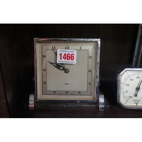 1466 - An Art Deco chrome desk timepiece, 14cm wide; together with a similar desk calendar; and thermometer... 