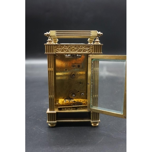 1467 - An antique brass carriage timepiece, height including handle 15.5cm.