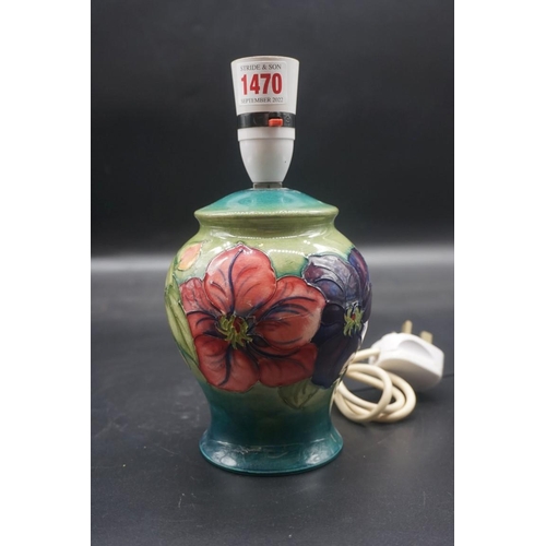 1470 - A Moorcroft 'Clematis' pattern table lamp, total height 22.5cm; together with a 'Tribute to Charles ... 