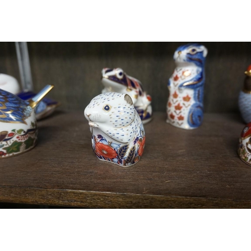 1477 - Twelve Royal Crown Derby Imari paperweights, each with stopper, to include: Armadillo.... 