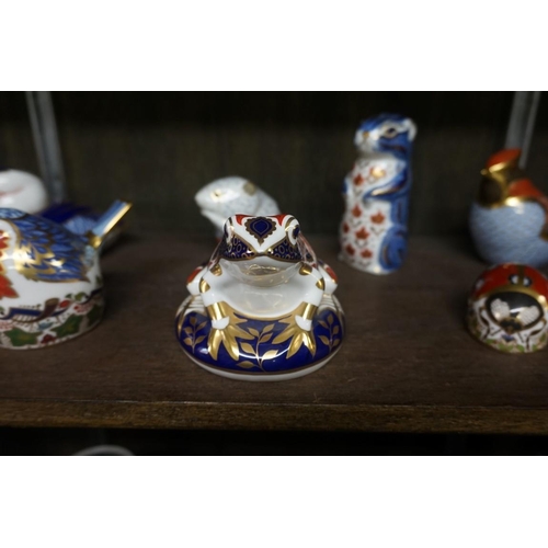 1477 - Twelve Royal Crown Derby Imari paperweights, each with stopper, to include: Armadillo.... 