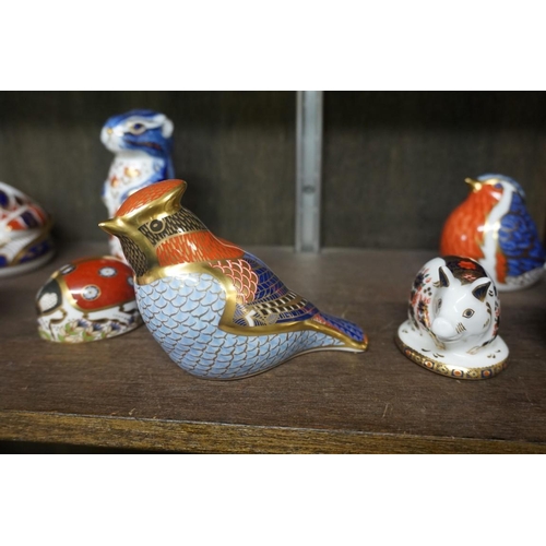 1477 - Twelve Royal Crown Derby Imari paperweights, each with stopper, to include: Armadillo.... 