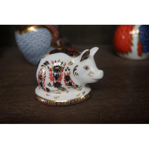 1477 - Twelve Royal Crown Derby Imari paperweights, each with stopper, to include: Armadillo.... 