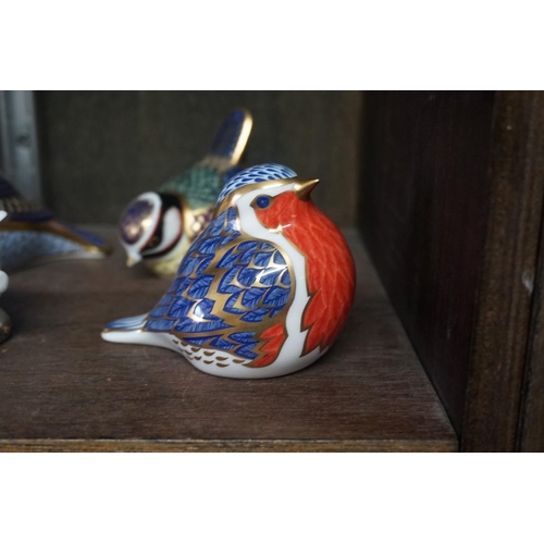 1477 - Twelve Royal Crown Derby Imari paperweights, each with stopper, to include: Armadillo.... 