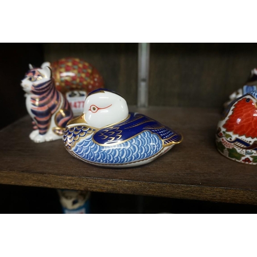 1477 - Twelve Royal Crown Derby Imari paperweights, each with stopper, to include: Armadillo.... 