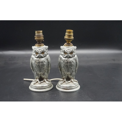 1480 - A pair of nickel plated novelty owl table lamps, with glass inset eyes, total height 21cm. ... 