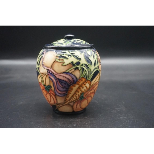 1492 - Two Moorcroft vases, comprising: 'a Vegetable Patch' pattern jar and cover, 15cm high; and a 'Bullru... 