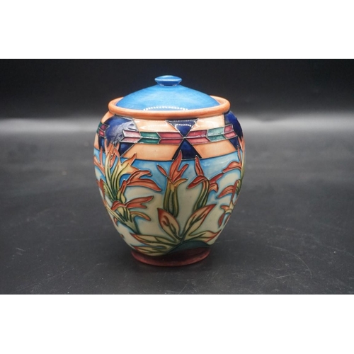 1508 - Two Moorcroft vases, comprising: a 'Indian Paintwork' pattern jar and cover, 15cm high; and a 'Bullr... 