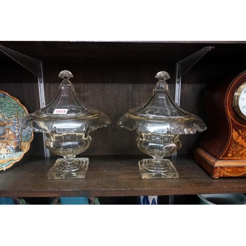 1514 - A pair of 19th century cut glass pedestal bowls and covers, probably Irish, 30cm high, (chip to corn... 