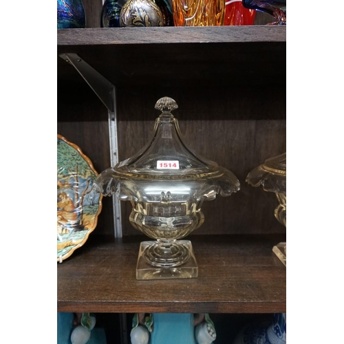 1514 - A pair of 19th century cut glass pedestal bowls and covers, probably Irish, 30cm high, (chip to corn... 