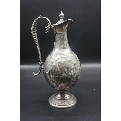 1521 - A plated metal mounted cut glass claret jug; together with another plated metal example, latter 33cm... 