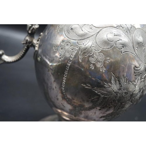 1521 - A plated metal mounted cut glass claret jug; together with another plated metal example, latter 33cm... 