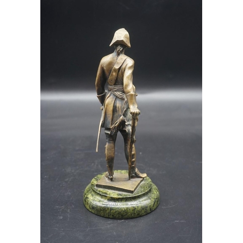 1556 - A bronze figure of a gentleman with a tricorn hat, on marble base, 22cm high. ... 