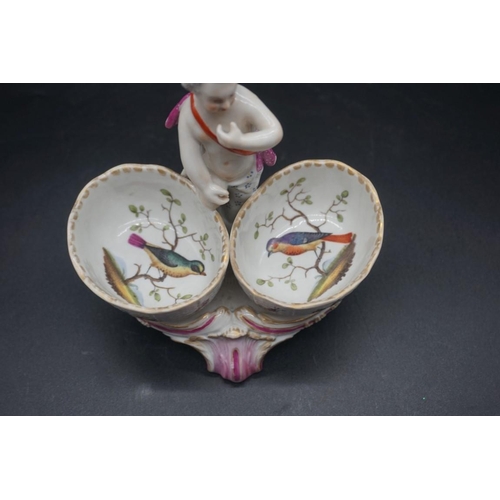 1562 - A Meissen style figural double salt, painted with exotic birds, 12.5cm high. ... 