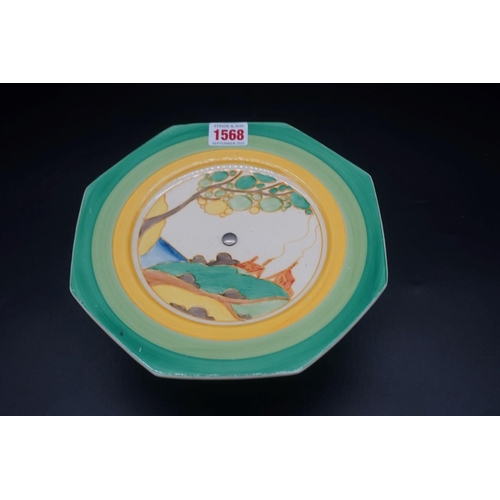 1568 - A Clarice Cliff 'Secrets' pattern octagonal plate, on plated metal foot, 22cm wide, (crazed).... 