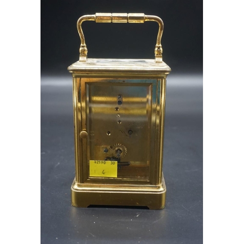 1577 - An antique brass carriage timepiece, inscribed 'Presented to Station Master King, by the Office... 