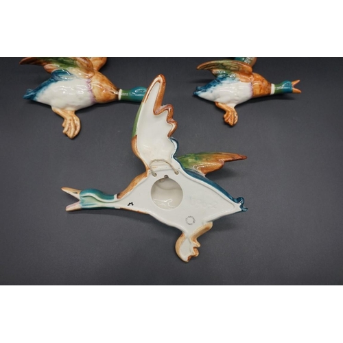 1578 - A graduated part set of three Beswick mallard wall plaques, largest 22cm long.