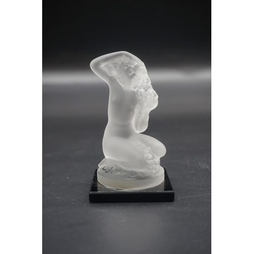 1595 - A Lalique frosted glass 'Floreal' figure, 9cm high.