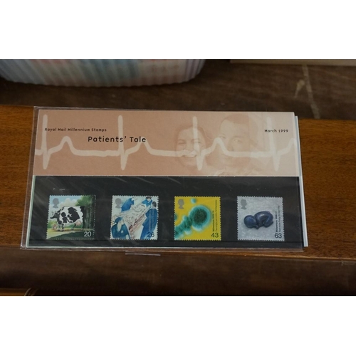 1609 - Stamps: a small collection of FDCs; presentation packs; and an album.