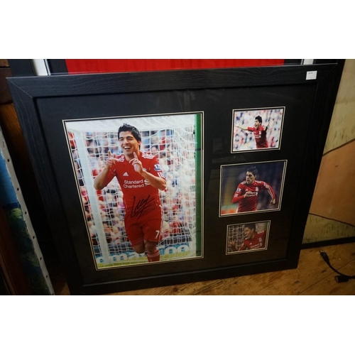 1611A - Liverpool FC: a signed photograph of Steven Gerrard, I.36 x 24cm; and another of Luis Suarez. (2)... 