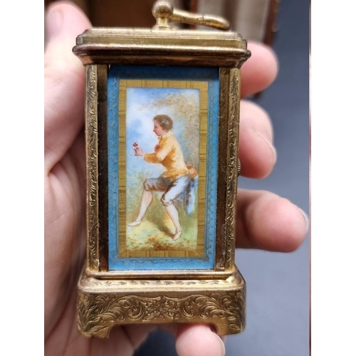 1652 - A good miniature late 19th century engraved gilt brass and porcelain carriage timepiece, the panels ... 