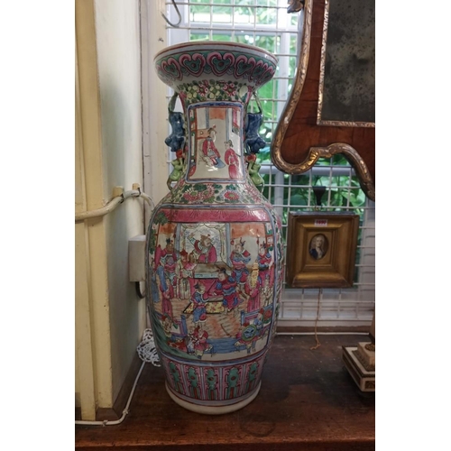 1689 - A large Chinese twin handled famille rose vase, late 19th century, 61.5cm high, (repaired).... 