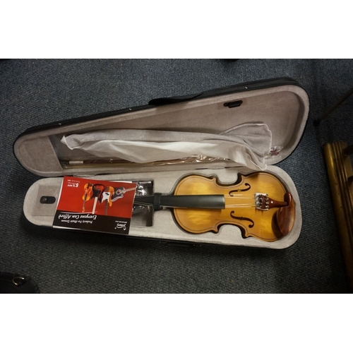 1708 - Five various violins, each with bow and in padded case. 