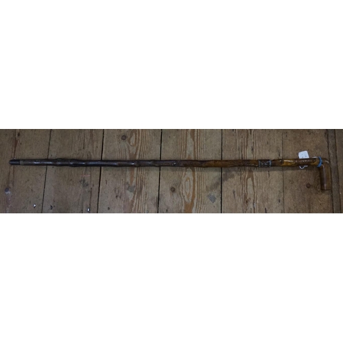 1714 - An antique sword stick, with Damascus quatreform 34cm blade.