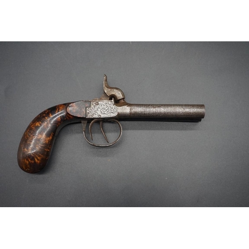 1737 - A 19th century double barrel percussion pistol, with 8cm Damascus style barrels and floral scroll de... 