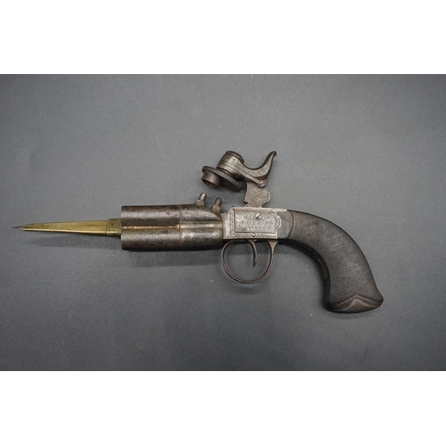 1738 - A 19th century Irish Rigby system four barrel percussion pistol with screw in spike, the lock inscri... 