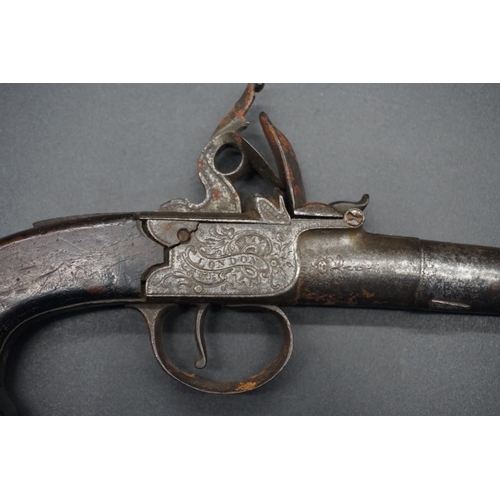 1740 - An antique flintlock pocket pistol, by 'Perry, London', with walnut grip, overall length 19.5cm.... 